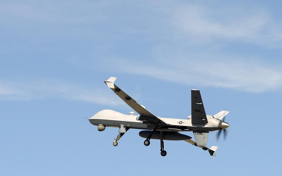 A military drone flies over a base in Nevada.